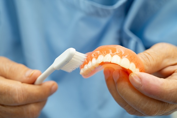 Can The Wrong Adhesive Lead To Denture Damage?